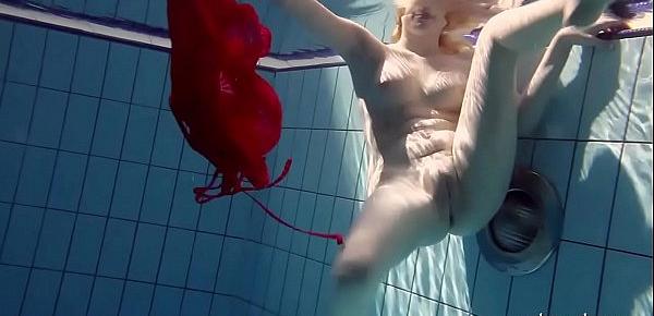  Hot blonde Lucie French teen in the pool